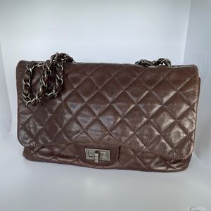 Chanel Mademoiselle lock chain quilted bag